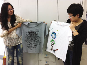 沈大學(xué)生畫“環(huán)保T恤”獲中華環(huán)?；鹳Y助