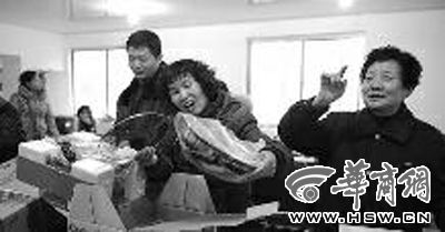 讓西安的天越來越藍(lán)45戶居民領(lǐng)到環(huán)保灶具了(圖)